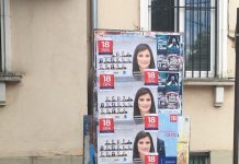 Активисти на БСП лепят номера на бюлетината си върху плакати на ГЕРБ герб