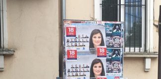 Активисти на БСП лепят номера на бюлетината си върху плакати на ГЕРБ герб