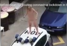 Блондинка протестира гола върху полицейска кола срещу ограниченията заради короновируса